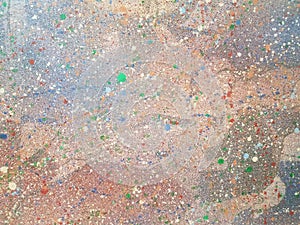 Paint speckles on a surface