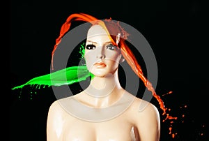 Paint splash on manekin head