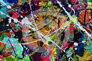 Paint splatter covers the canvas in this Pollock style painting for backgrounds.