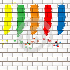 Paint stains on the brick wall