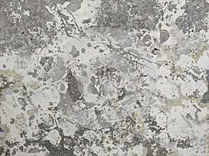 Abstract Dark Grunge wall texture background. Paint cracking off dark wall with rust underneath.distressed crackled texture.