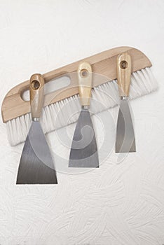 Paint tools for repair, spatula and brush