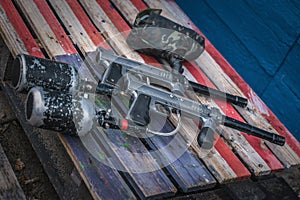 Paintball equipment. Special gun and extreme sport protective equipment mask