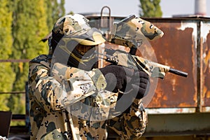 Paintball player in camouflage