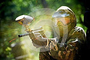 Paintball player direct hit photo