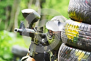 Paintball player holding position