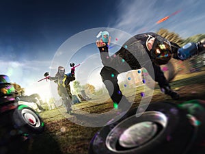 Paintball players are playing the game photo