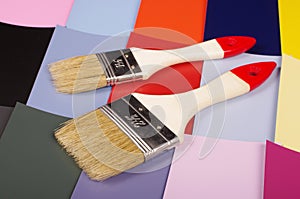 Paintbrush and colour sample cards