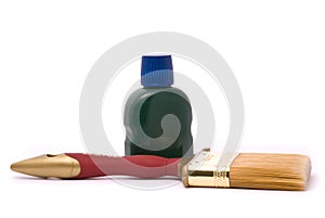 Paintbrush and green paint
