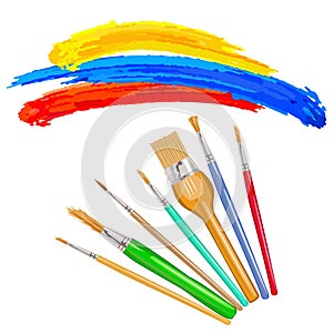 Art paint brushes with color paint isolated on white background.