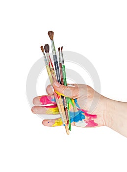Paintbrushes in hand