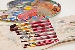 Paintbrushes and painter's palette