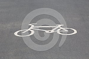 Painted bicycle logo on a cycle path