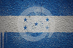 painted big national flag of honduras on a massive old cracked wall