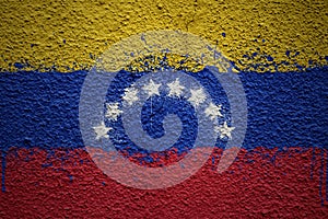 painted big national flag of venezuela on a massive old cracked wall