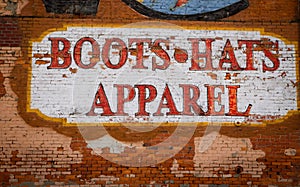 Painted boots,hats and apparel sign