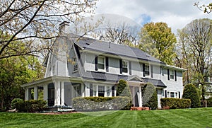 Painted Brick House with Side Porch photo