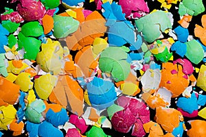 Painted broken egg shells on black