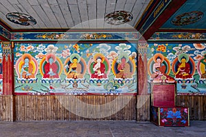 Painted Buddha images in the temple of Tibetan Buddhism Temple in Sikkim, India