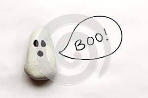 Painted Cartoon Halloween Ghost Rock on White Background with Bo