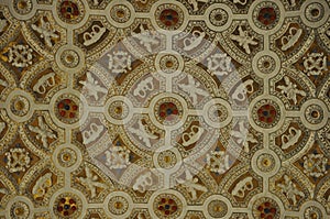 Painted ceiling in baroque style with golden geometric patterrn with circles and lines