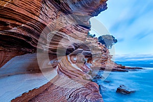 Painted cliffs on Maria Island, Tasmania photo
