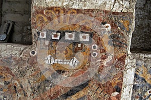 Painted decoration on the huaca wall of the Chimu civilization El Brujo archaeological site with geometric