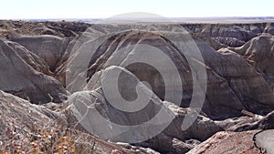 The Painted Desert on a sunny day. Diverse sedimentary rocks and clay washed out by water. Petrified Forest National Park, USA,