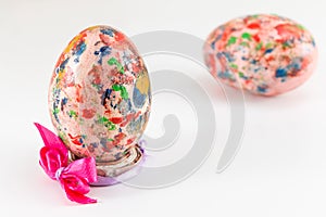 Painted Easter egg in custom egg holder