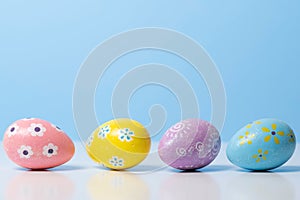 Painted Easter eggs on a colorful background