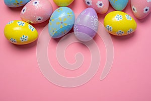 Painted Easter eggs on a colorful background