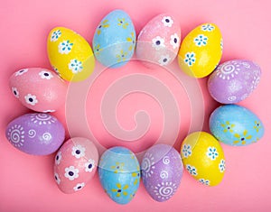 Painted Easter eggs on a colorful background