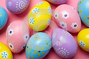 Painted Easter eggs on a colorful background