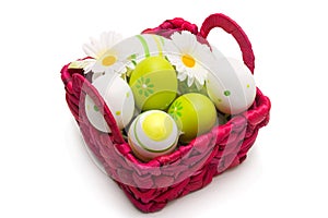 Painted eggs in busket
