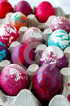 Painted eggs with different colors for Easter