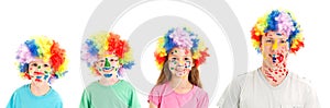 Painted faces clown wigs on family of dad and kids