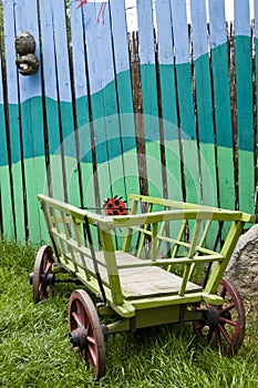 Painted fence with Hay-waggon photo