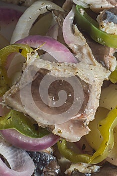 painted fish and catfish on a plate with vegetables and seasoning, selective focus and copy space " Siluriformes"