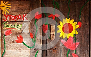 Painted Flowers on Wooden House
