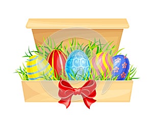 Painted or Foiled Easter Eggs or Paschal Eggs Rested in Carton Package on Green Grass Vector Illustration