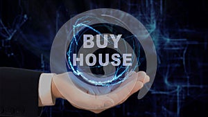 Painted hand shows concept hologram Buy house on his hand