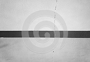 Painted line on a cracked wall texture backdrop