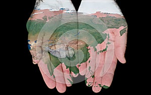 Painted Map Of Asia In Our Hands