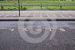 Painted marking on road indicating taxi rank Birkenhead Wirral January 2020