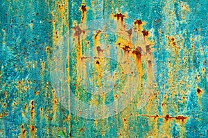 Painted metal surface with rust streaks