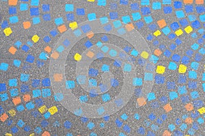 Painted mosaic pattern on a sidewalk