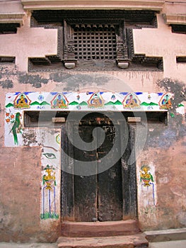 Painted Murals and Wooden Door in Kathmandu, Nepal