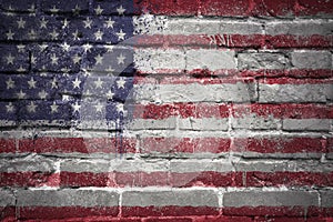 Painted national flag of united states of america on a brick wall
