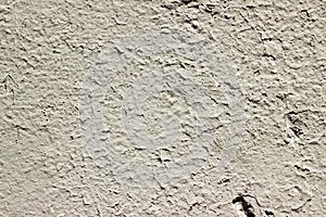 Painted old concrete white cracked wall background texture