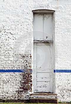 Painted peeling white brick